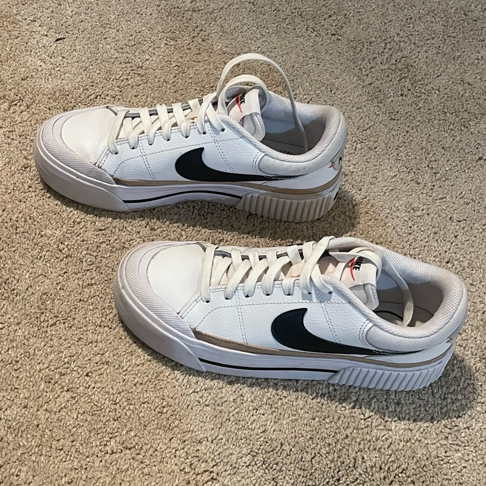 Nikes - Womans 7